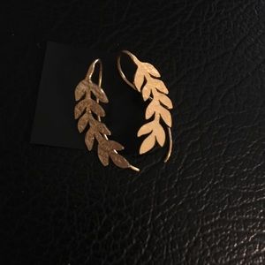 Noonday Collection gold leaf earrings